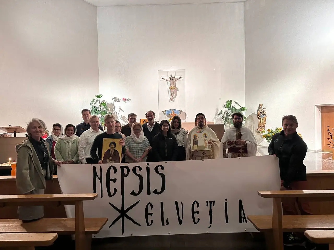 Tineri Nepsis cu steagul Nepsis Elveția în biserică